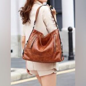 Brown purse lots of Pockets see pics for small wear spots